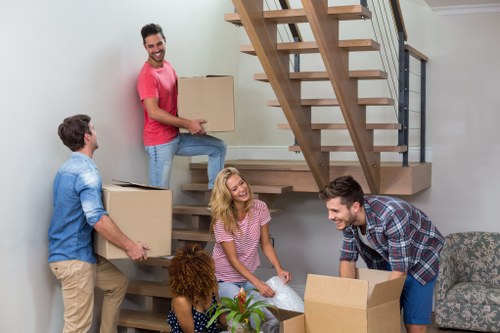 Moving boxes and furniture prepared for a Kennington relocation