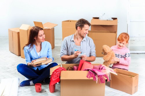 Packed household boxes and furniture ready for a Kennington move
