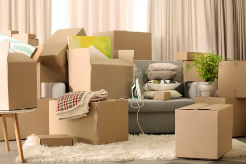 Removal crew handling desks and boxes during a commercial relocation